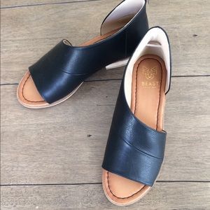 Open toe black flats